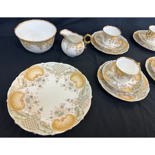 75 - Part chapman tea service includes sugar bow, milk jug, cake plate, cups, saucers etc