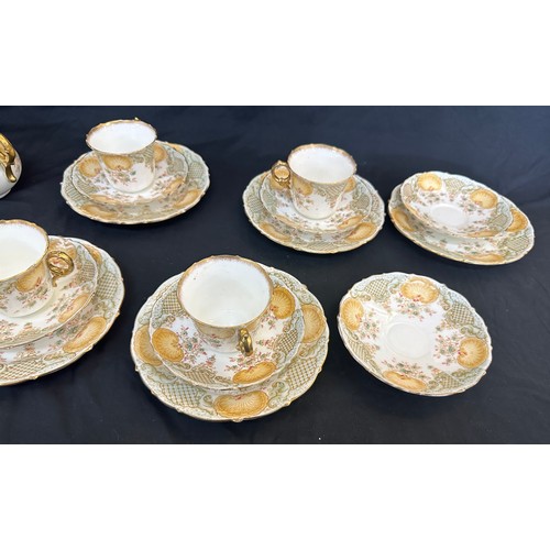 75 - Part chapman tea service includes sugar bow, milk jug, cake plate, cups, saucers etc