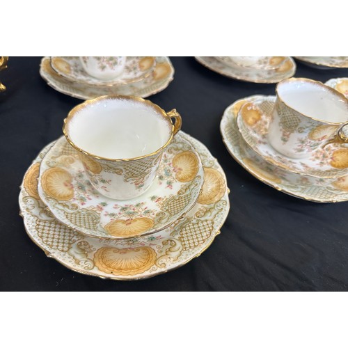 75 - Part chapman tea service includes sugar bow, milk jug, cake plate, cups, saucers etc