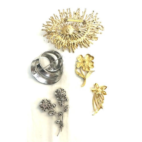 390 - Selection of costume brooches includes marcasite and a 9ct gold seed pearl brooch