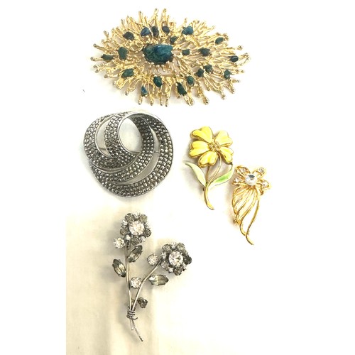 390 - Selection of costume brooches includes marcasite and a 9ct gold seed pearl brooch