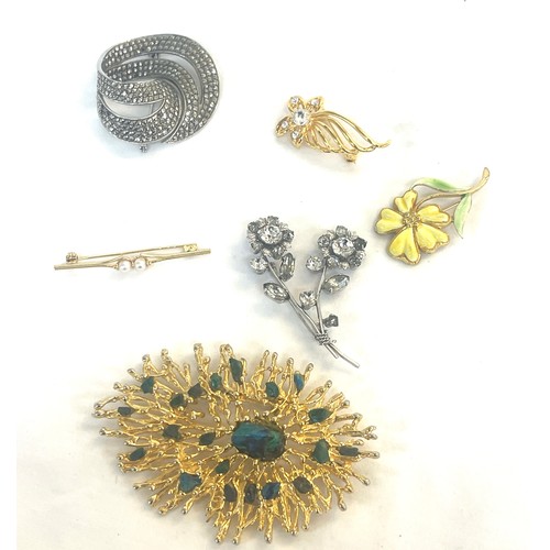 390 - Selection of costume brooches includes marcasite and a 9ct gold seed pearl brooch