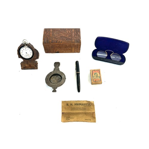 311 - Box of miscellaneous includes pocket watch on stand, fountain pen etc