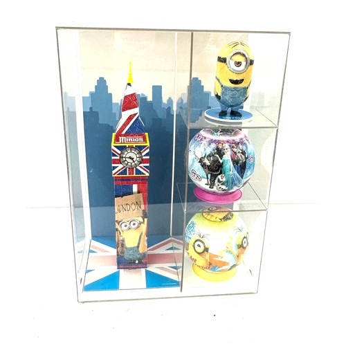 19 - Perspex show case with four 3d puzzles includes Minions etc