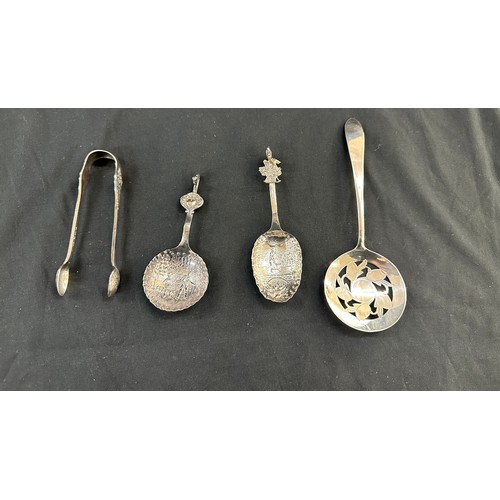 309 - Silver sugar tongs, 2 Novelty spoons etc