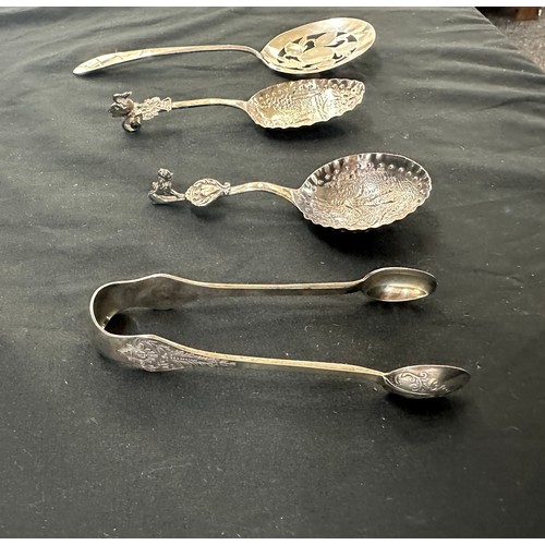 309 - Silver sugar tongs, 2 Novelty spoons etc