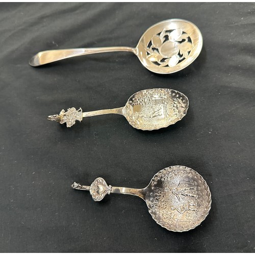 309 - Silver sugar tongs, 2 Novelty spoons etc