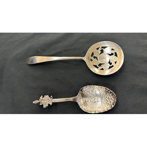 309 - Silver sugar tongs, 2 Novelty spoons etc