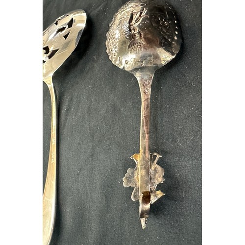 309 - Silver sugar tongs, 2 Novelty spoons etc