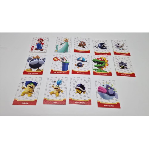 313 - A large collection of trading cards memorabilia,

Includes

Super mario bros panini collector cards
... 