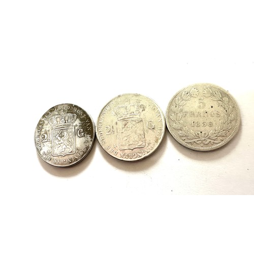 401 - Selection 3 solid silver antique foreign coins to include a franc and Netherland coins, approximate ... 