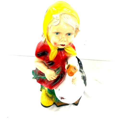 65 - Plastic garden figure of a young girl and a goose, height approximately 19 inches