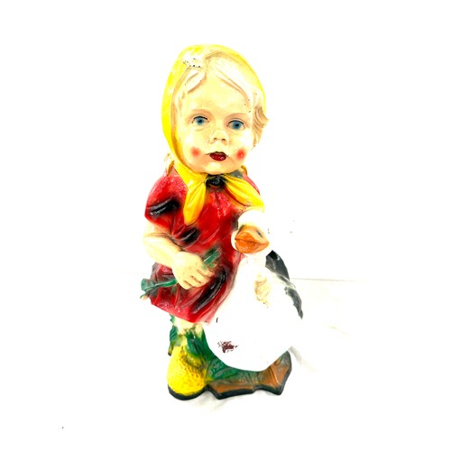 65 - Plastic garden figure of a young girl and a goose, height approximately 19 inches