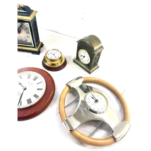 42 - Selection of battery operated clocks to include wall hanging, mantel clocks etc, all untested