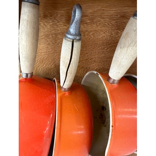 73 - Le Creuset pan and  set with wooden Le Creuset hanging stand, split to one of the wooden handles