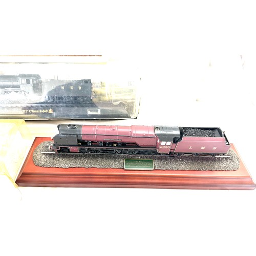 64 - Selection of various railway models on display plinths to include Duchess LMS, LNER flying Scotsman,... 