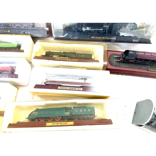 64 - Selection of various railway models on display plinths to include Duchess LMS, LNER flying Scotsman,... 