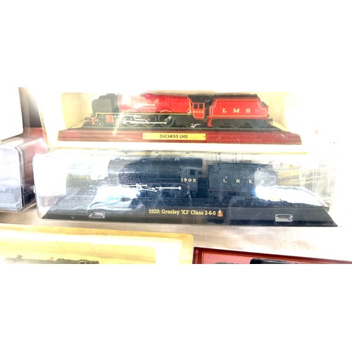 64 - Selection of various railway models on display plinths to include Duchess LMS, LNER flying Scotsman,... 