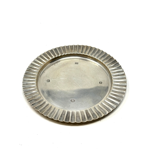 107 - silver hallmarked ribbed plate sheffield silver hallmarks measures approx 13cm dia