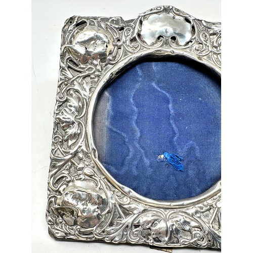 94 - 2 silver picture frames largest antique frame measures approx 15cm by 13cm in need of restoration as... 