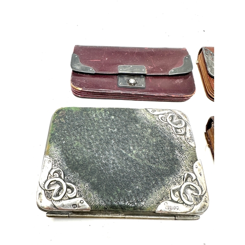 144 - 4 antique silver mounted leather purses