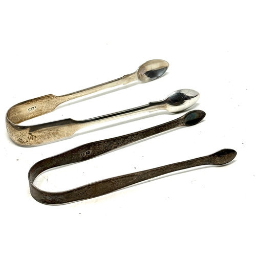 102 - 2 antique silver sugar tongs