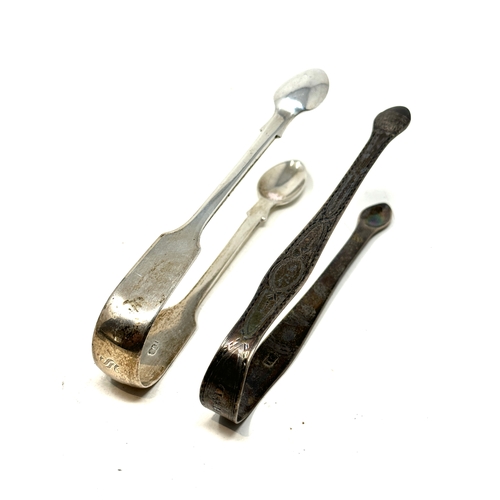 102 - 2 antique silver sugar tongs