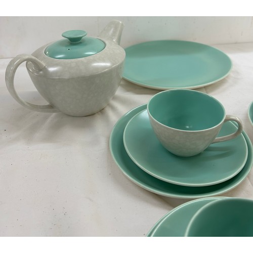 60 - Four piece Poole tea service to include cups, saucers, tea pots etc