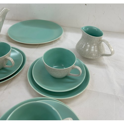 60 - Four piece Poole tea service to include cups, saucers, tea pots etc