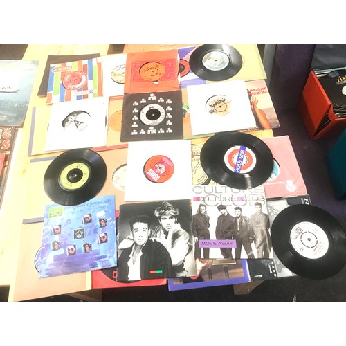 44 - Large selection of 45s includes The Jacksons, The flying pickets, etc in 2 cases