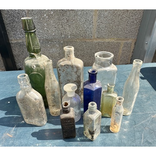 21 - Selection of vintage glass bottles