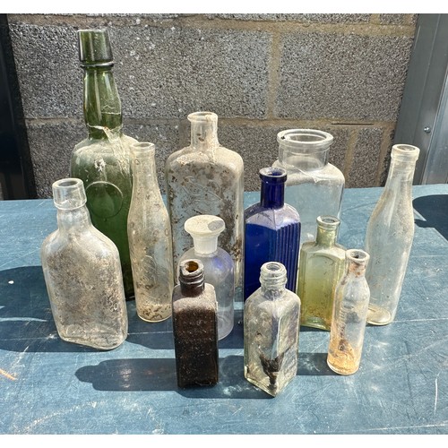 21 - Selection of vintage glass bottles