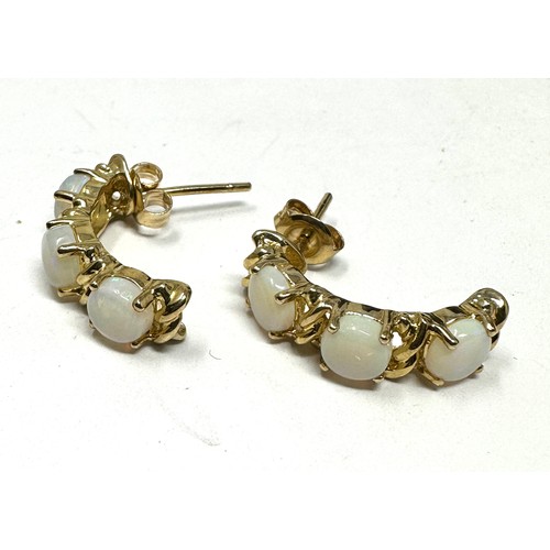 291 - 9ct gold opal  half-hoop earrings (3.3g)