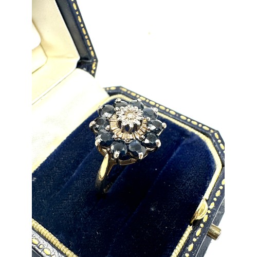 289 - 9ct gold diamond & sapphire ring (3.6g)