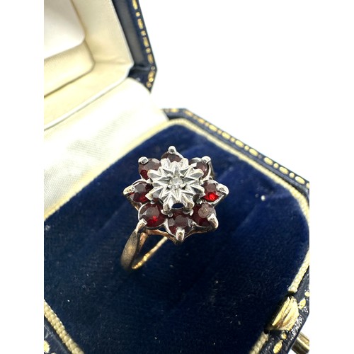 332 - 9ct gold diamond & garnet dress ring (2.1g)