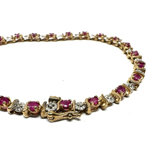 258 - 9ct gold ruby & diamond bracelet (7.5g)