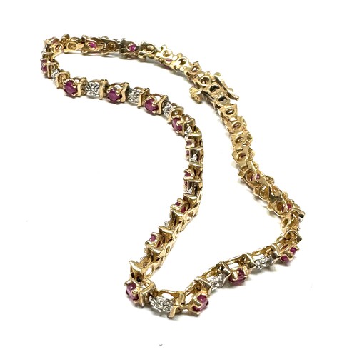 258 - 9ct gold ruby & diamond bracelet (7.5g)