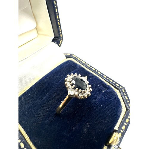 217 - 9ct gold diamond and sapphire halo ring (1.8g)