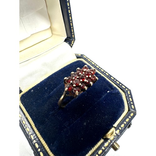 216 - 9ct gold garnet cluster ring (2.2g)