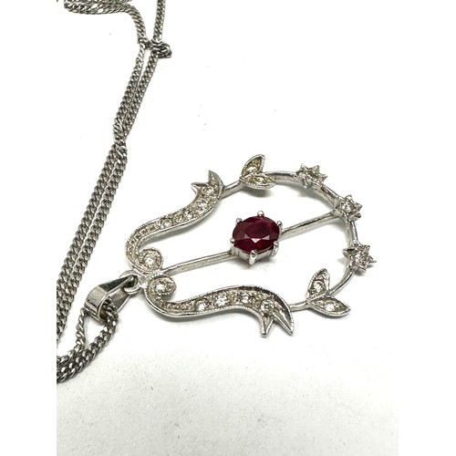 195 - 18ct white gold antique diamond and ruby pendant necklace (4.9g)