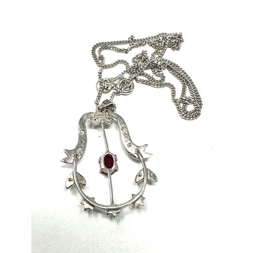 195 - 18ct white gold antique diamond and ruby pendant necklace (4.9g)