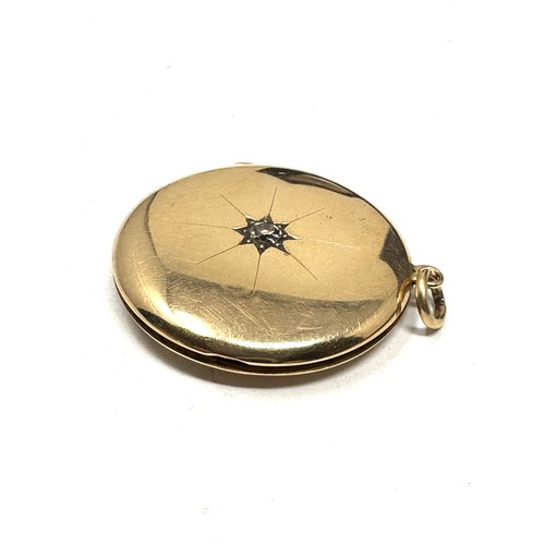 379 - Antique 15ct rose gold & diamond round locket pendant (11.7g)