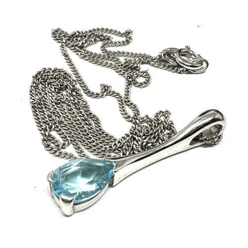 240 - 9ct white gold blue topaz pendant necklace (3g)