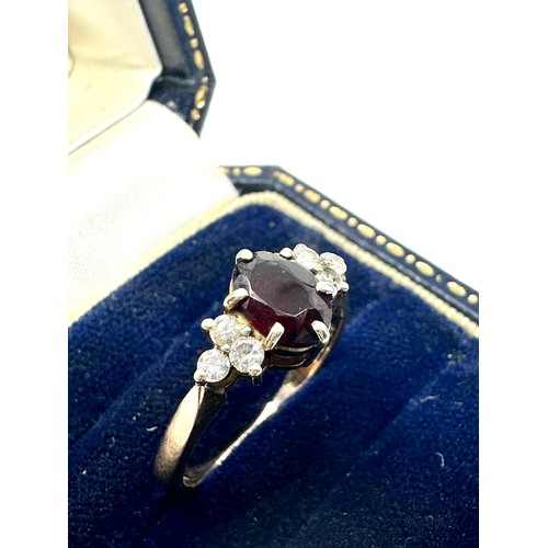 231 - 9ct gold garnet & diamond cluster dress ring (2.3g)