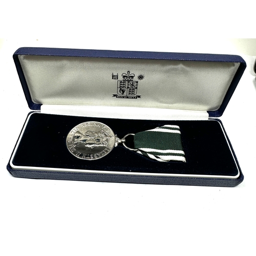49 - Rre boxed ER.11 Ambulance service emergency duties medal to garth green