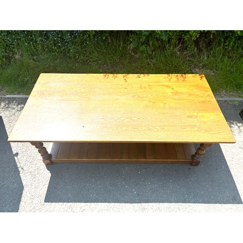 598 - Large coffee table with single shelf and 3 drawers both sides, approximate measurements length 63 in... 