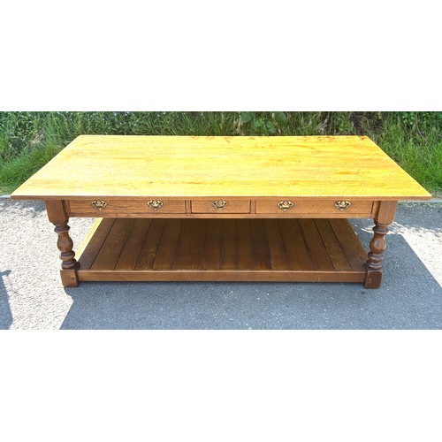 598 - Large coffee table with single shelf and 3 drawers both sides, approximate measurements length 63 in... 