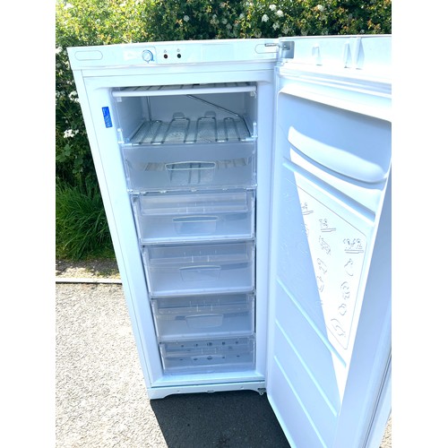 590 - Tall Indesit freezer, approximate measurements: Height 59 inches, Width 24 inches