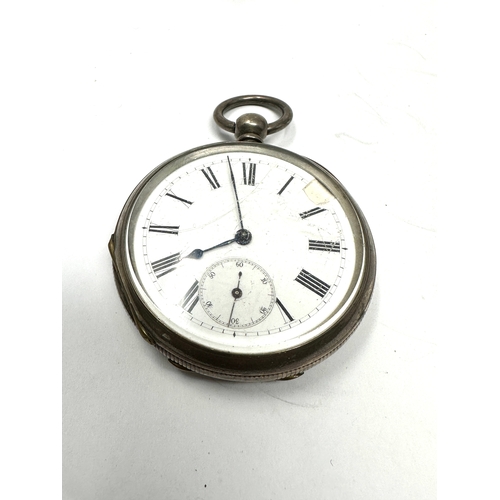 490 - Antique silver open face pocket watch the watch is ticking