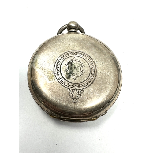 490 - Antique silver open face pocket watch the watch is ticking